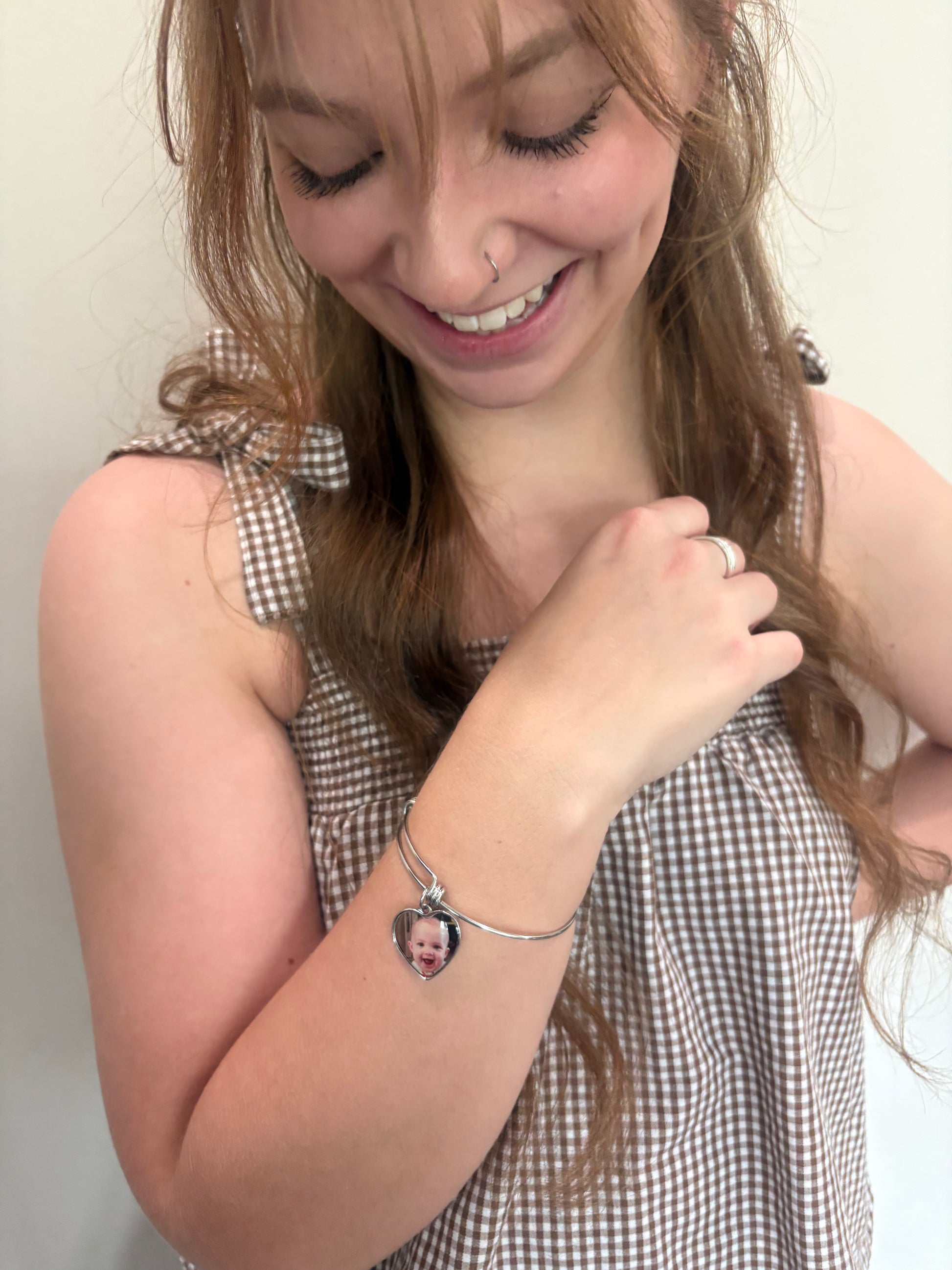 Sarah wearing her Always be Your Baby bangle bracelet for her First Mother's Day